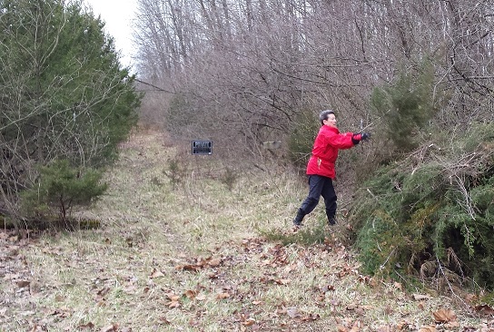 Joy Marley clearing trailhead area